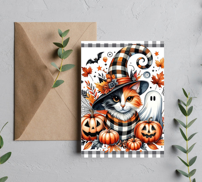 Halloween calico cat wearing a witch hat with pumpkins and ghost