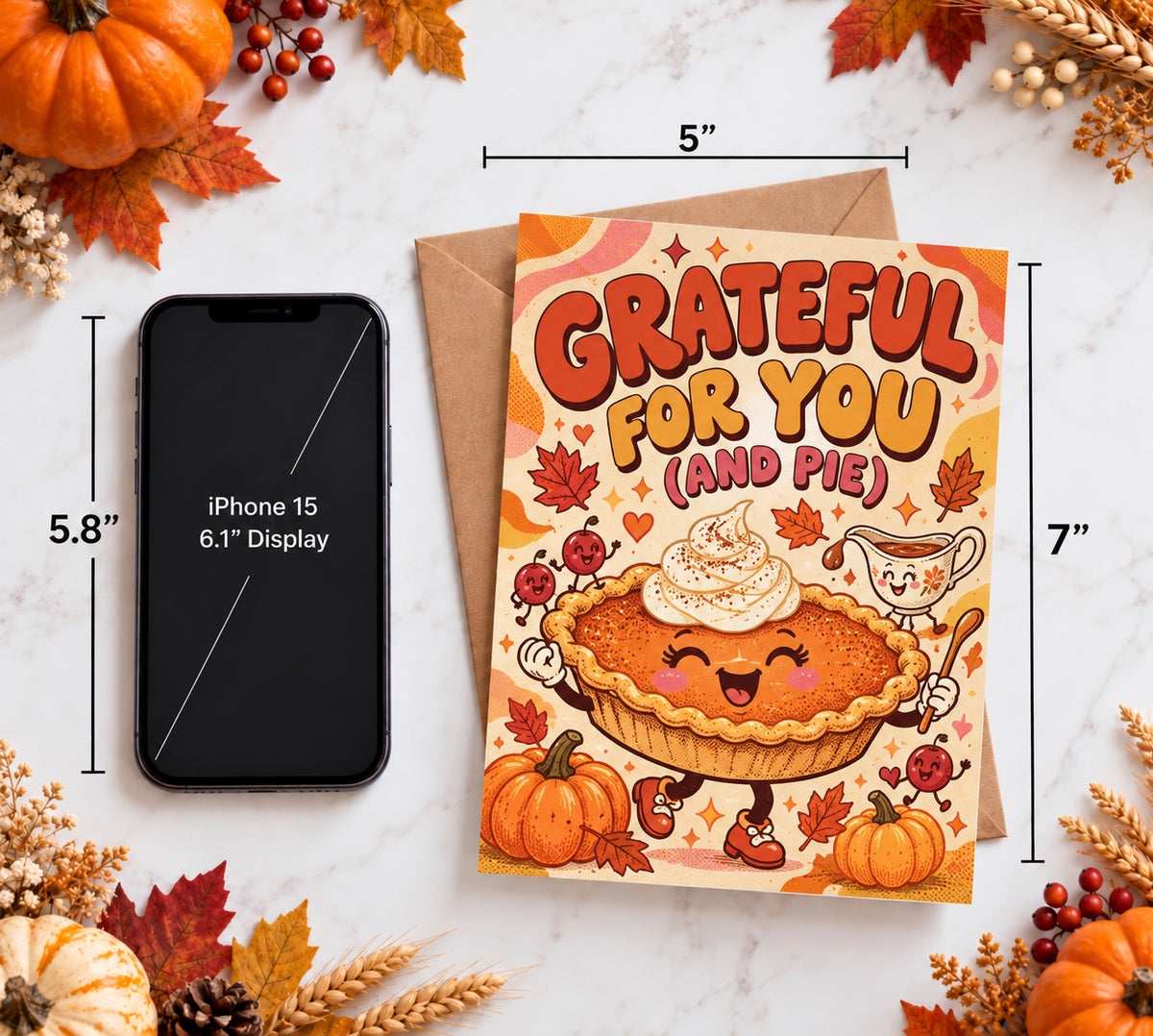 5 by 7 inch pumpkin pie Thanksgiving greeting card next to phone for scale