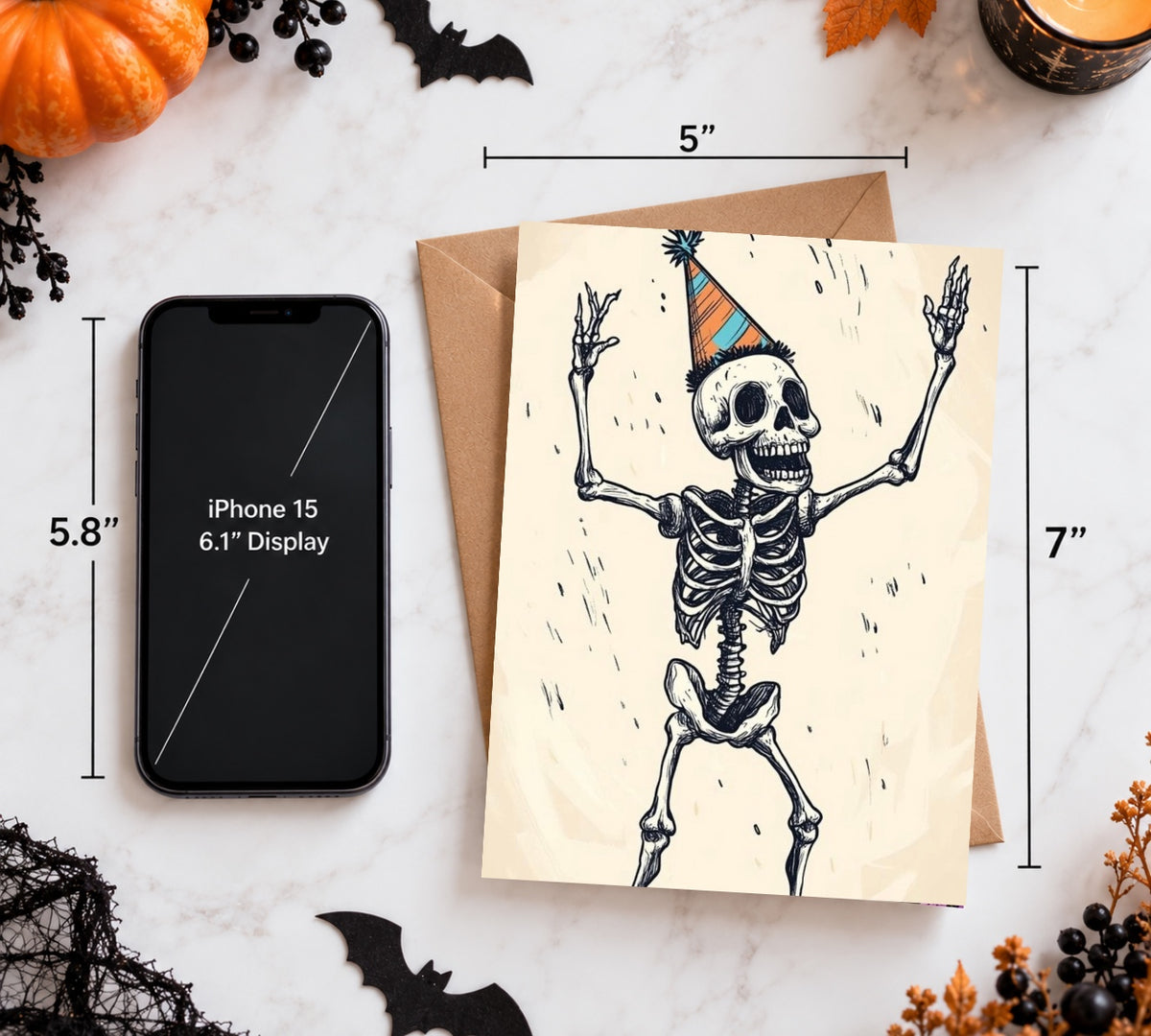 5 by 7 inch Halloween skeleton birthday card size comparison with iPhone