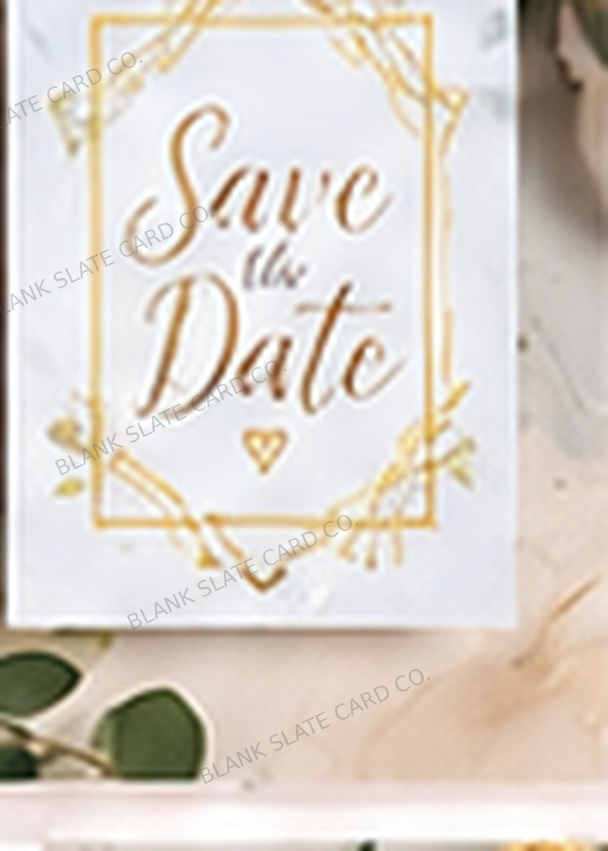 Golden botanical frame Save the Date card graphic with Blank Slate Card Co. watermark