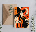The Witch Is In vintage Halloween greeting card in orange with brown envelope