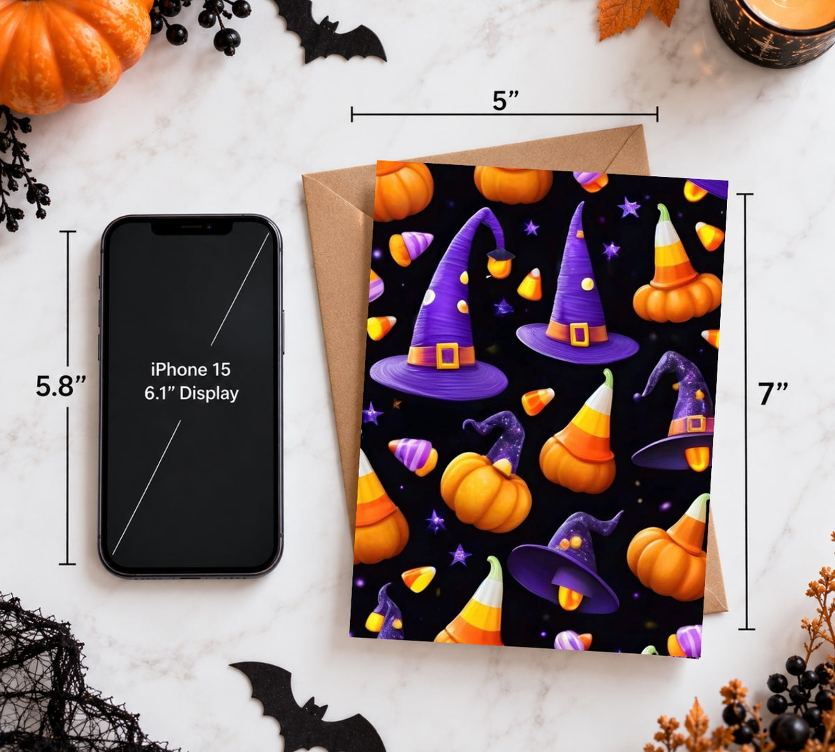 5 by 7 inch witch hats and pumpkins card with a kraft envelope and phone for scale
